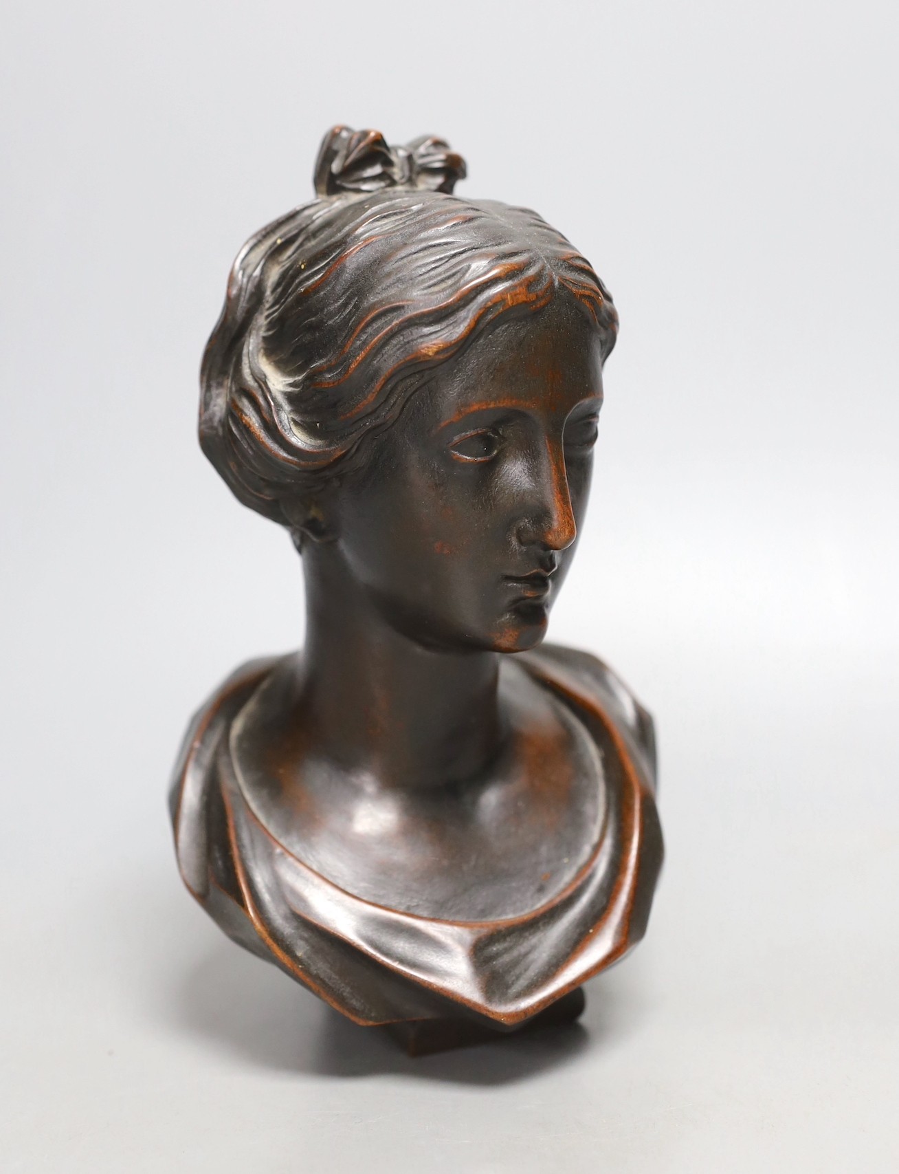 A 19th century walnut bust of a Greek goddess - 20cm high